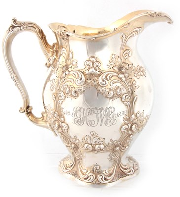 Lot 371 - AN AMERICAN ART NOUVEAU SILVER GILT WATER JUG...