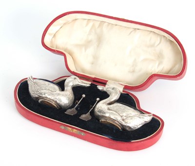 Lot 383 - A CASED PAIR OF FIGURAL SILVER SALTS MODELLED...
