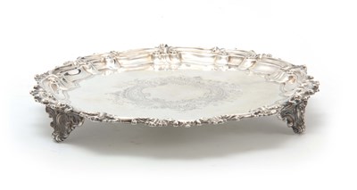 Lot 385 - A VICTORIAN SILVER SALVER with scrolled leaf...
