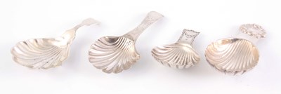 Lot 386 - A COLLECTION OF FOUR SILVER CADDY SPOONS app....