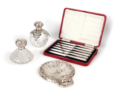 Lot 391 - AN EDWARD VII BULBOUS CUT GLASS DRESSING TABLE...