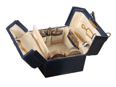 Lot 402 - AN EARLY 20th CENTURY MINIATURE BLUE LEATHER...