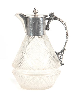 Lot 406 - A LATE 19TH CENTURY SILVER MOUNTED CLARET JUG...