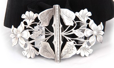 Lot 408 - AN EDWARDIAN SILVER NURSES BELT BUCKLE of...