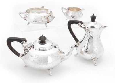 Lot 409 - A SILVER ARTS & CRAFTS DESIGN FOUR-PIECE TEA...
