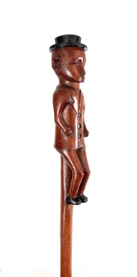 Lot 438 - A 19TH CENTURY FOLK ART WALKING CANE carved...