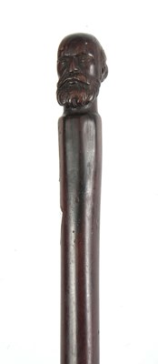 Lot 439 - A 19TH CENTURY ROSEWOOD WALKING STICK of...