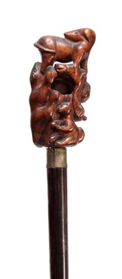 Lot 445 - A CHINESE CARVED HANDLED PUZZLE BALL WALKING...