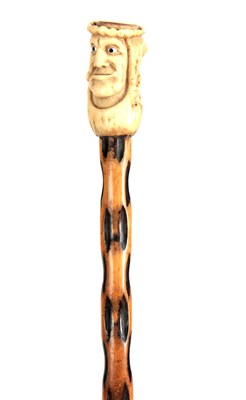 Lot 459 - A 19th CENTURY CARVED STAGHORN HANDLED WALKING...