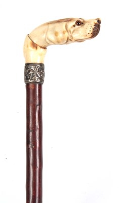 Lot 470 - A LATE 19TH CENTURY CARVED IVORY WALKING CANE...