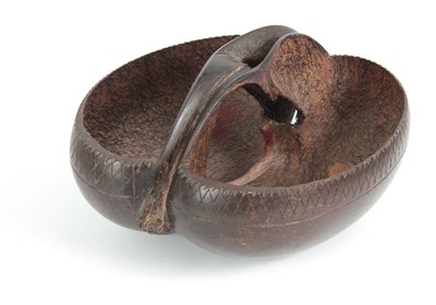 Lot 486 - A COCO DE MER (Lodoicea Maldivica) made into a...