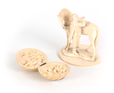 Lot 494 - A 19th CENTURY DIEPPE IVORY DIPTYCH modelled...