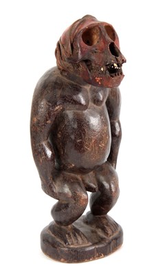 Lot 504 - A LATE 19TH CENTURY AFRICAN CARVED FIGURE with...
