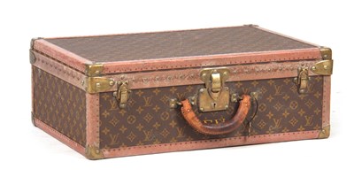 Lot 519 - A VINTAGE LOUIS VUITTON BROWN LEATHER SUITCASE...