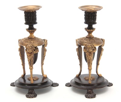 Lot 579 - A PAIR OF REGENCY BRONZE AND ORMOLU...