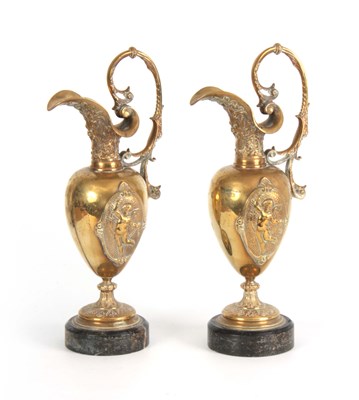 Lot 630 - A PAIR OF LATE 19TH CENTURY BRONZE EWERS...