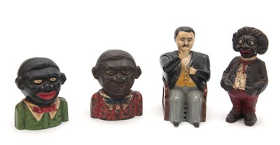Lot 635 - A COLLECTION OF PAINTED CAST IRON MONEY BANKS...