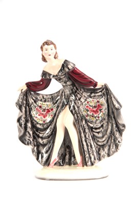 Lot 65 - A 1930'S GOLDSCHEIDER POTTERY FIGURINE OF A...