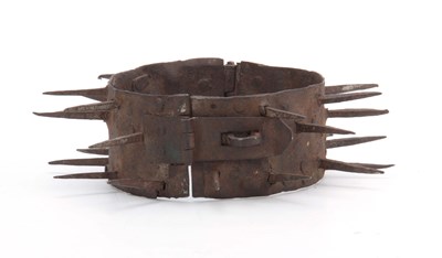 Lot 665 - A 19TH CENTURY IRON TURKISH DOG COLLAR having...