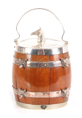 Lot 669 - AN EARLY 20th CENTURY OAK AND SILVERPLATED...