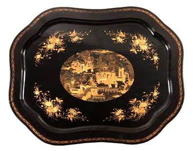 Lot 680 - A 19TH CENTURY SCALLOPED BLACK LACQUER AND...