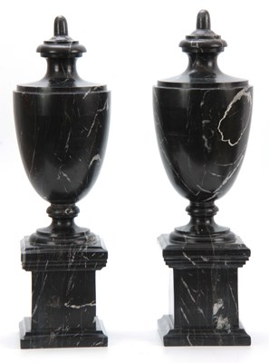 Lot 704 - A PAIR OF 20TH CENTURY BLACK VEINED MARBLE...