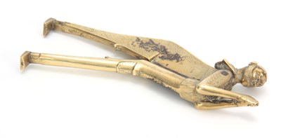 Lot 717 - A 19TH CENTURY BRASS FIGURAL BETEL NUT CUTTER...