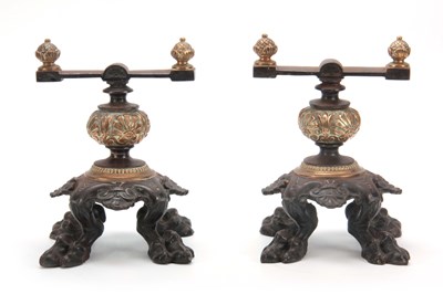 Lot 738 - A PAIR OF VICTORIAN BRONZE AND IRON FIRE DOGS...