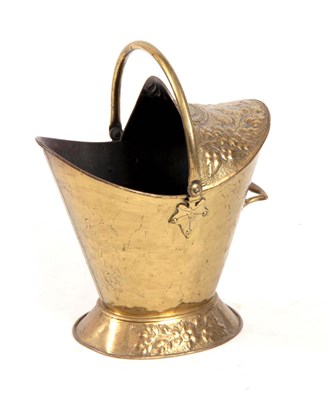 Lot 741 - A LATE VICTORIAN OVAL HOODED EMBOSSED BRASS...