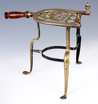 Lot 749 - A LATE GEORGIAN ENGRAVED BRASS HEARTH STAND...