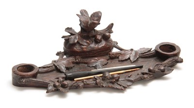 Lot 873 - A LATE 19TH CENTURY FRUIT AND LEAF CARVED...