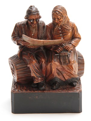 Lot 878 - A CONTINENTAL POLYCHROME CARVED FIGURE GROUP...