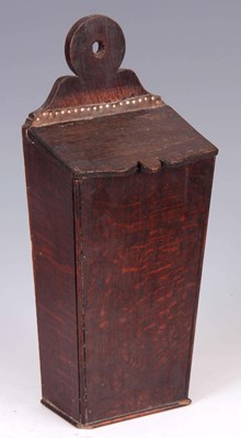 Lot 938 - A GEORGE III TAPERING OAK CANDLE BOX with ring-...