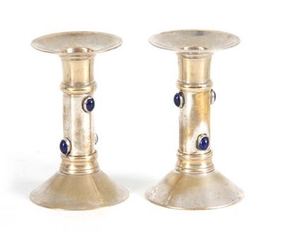 Lot 951 - A PAIR OF 20TH CENTURY ARTS AND CRAFTS SILVER...