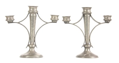 Lot 953 - A PAIR OF PEWTER ARTS & CRAFTS CANDELABRA...