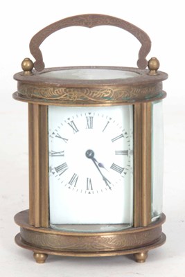 Lot 980 - A LATE 20th CENTURY OVAL CASED CARRIAGE CLOCK...
