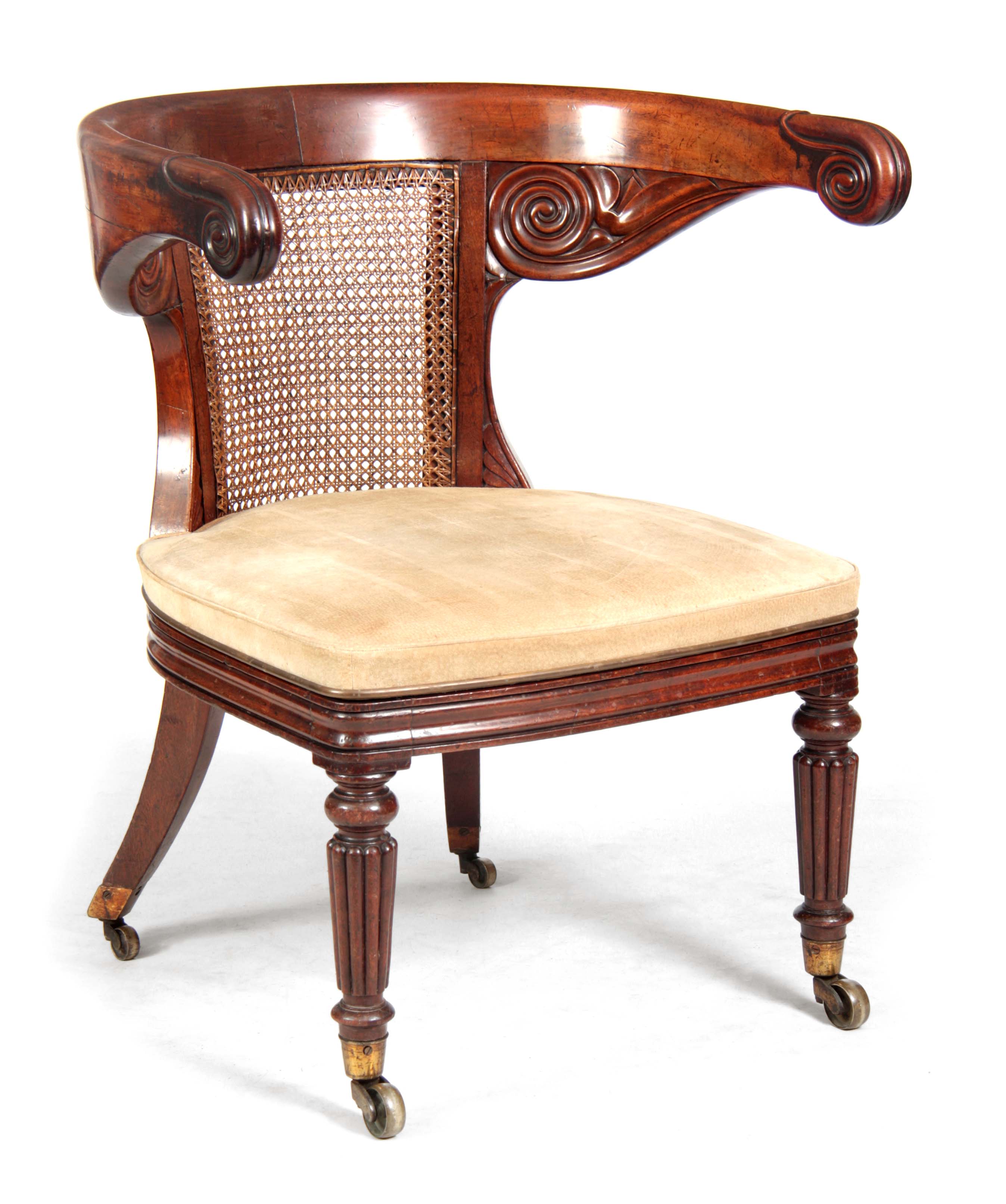Late Regency mahogany gentleman's bergere library armchair in the manner of Gillows sold by Hutchinson Scott