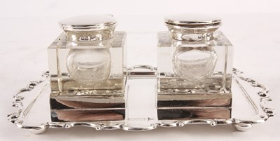 Lot 287 - AN EDWARDIAN SILVER INK STAND with scroll...