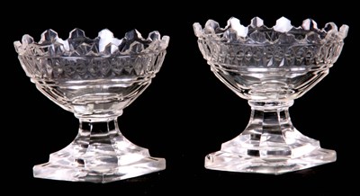 Lot 4 - A PAIR OF GEORGIAN CUT GLASS TABLE SALTS the...