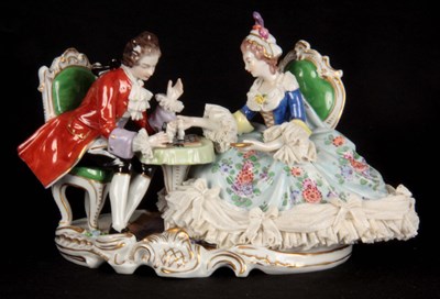 Lot 53 - A DRESDEN STYLE CONTINENTAL PORCELAIN FIGURE...