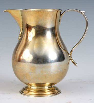 Lot 283 - A SILVER GILT SPARROW BEAK CREAM JUG of...