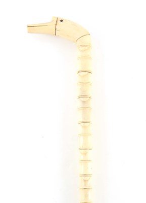 Lot 395 - A 19TH CENTURY MARINE IVORY WALKING STICK with...
