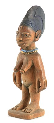 Lot 598 - AN AFRICAN CARVED YORUBA FEMALE IBEJI with...