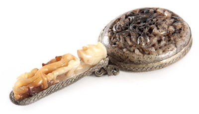 Lot 99 - AN ORIENTAL JADE AND SILVERED METAL DRESSING...