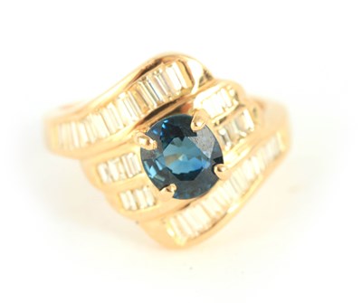 Lot 257 - A LADIES 18CT YELLOW GOLD SAPPHIRE AND DIAMOND...