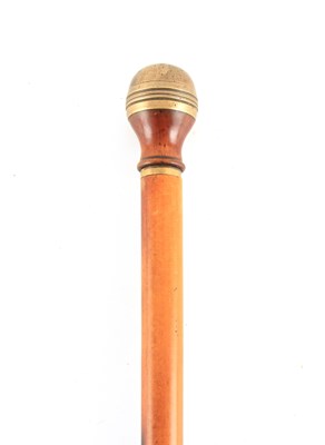 Lot 448 - A 19TH CENTURY MALACCA CANE WALKING STICK WITH...