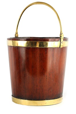 Lot 1025 - A GEORGE III BRASS BOUND MAHOGANY PEAT BUCKET...