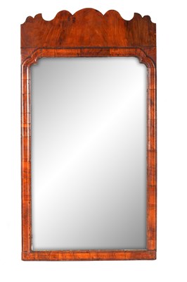 Lot 1040 - A QUEEN ANNE WALNUT LONG HANGING MIRROR with...