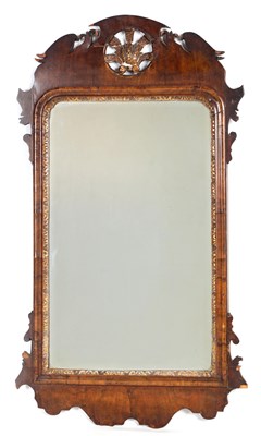 Lot 1046 - AN 18TH CENTURY WALNUT HANGING MIRROR with...