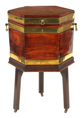 Lot 1085 - A GEORGE III MAHOGANY HEXAGONAL BRASS BOUND...